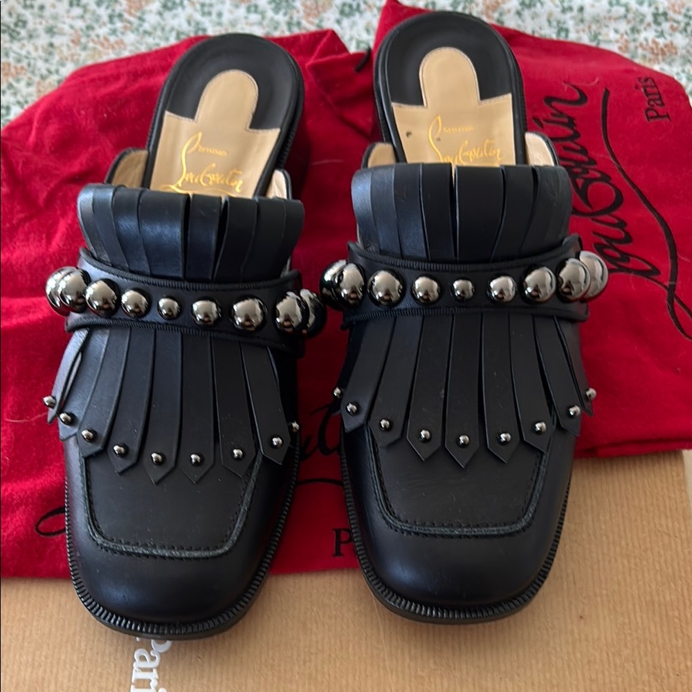 Christian Louboutin Black Mules Sleek Design